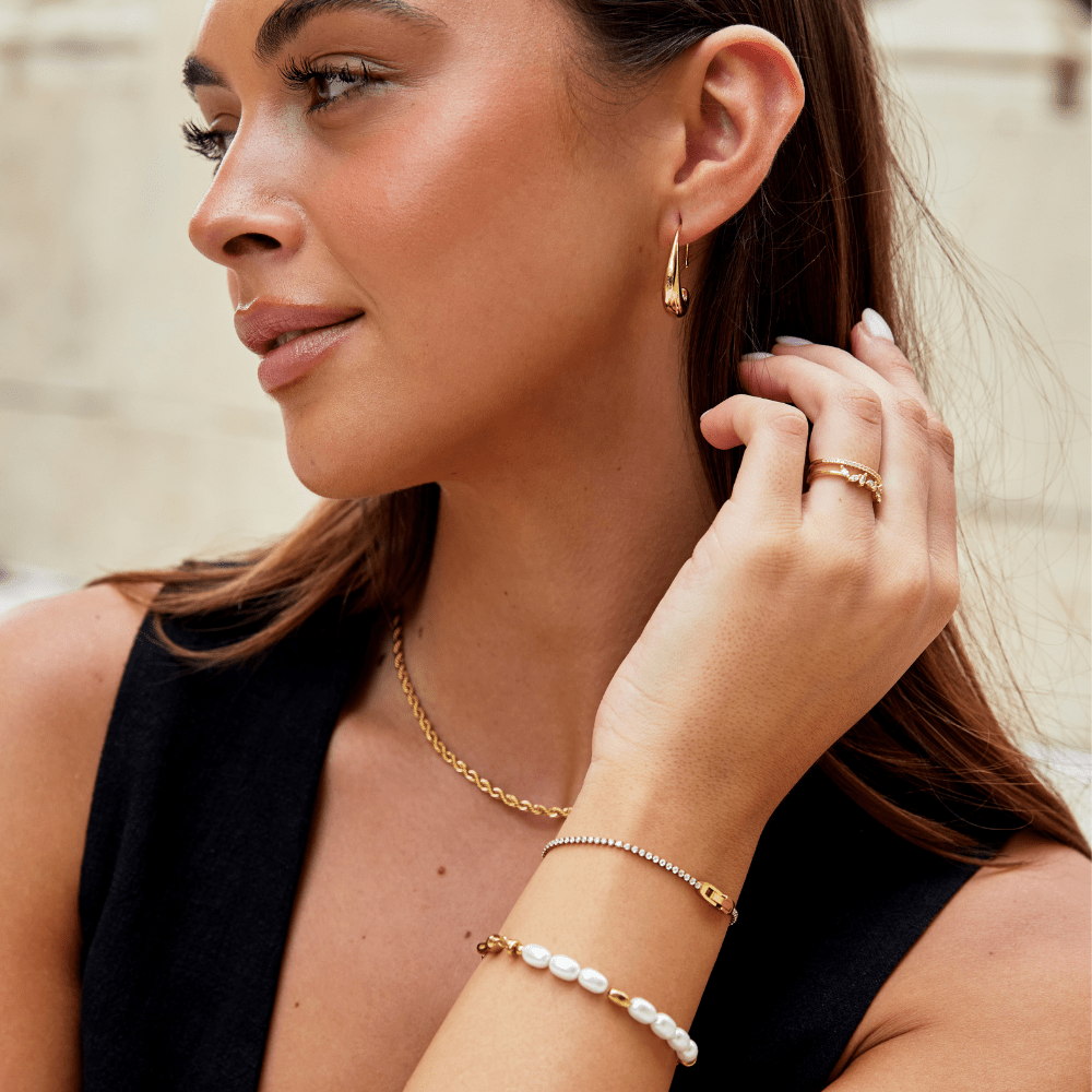 Pulseira Niyah Cristal Branco Dourada